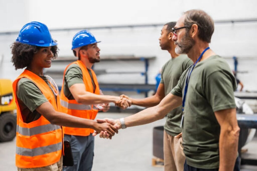Skilled tree service crew wearing safety gear at a job site